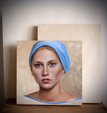 WOMAN IN A BLUE HEAD SCARF